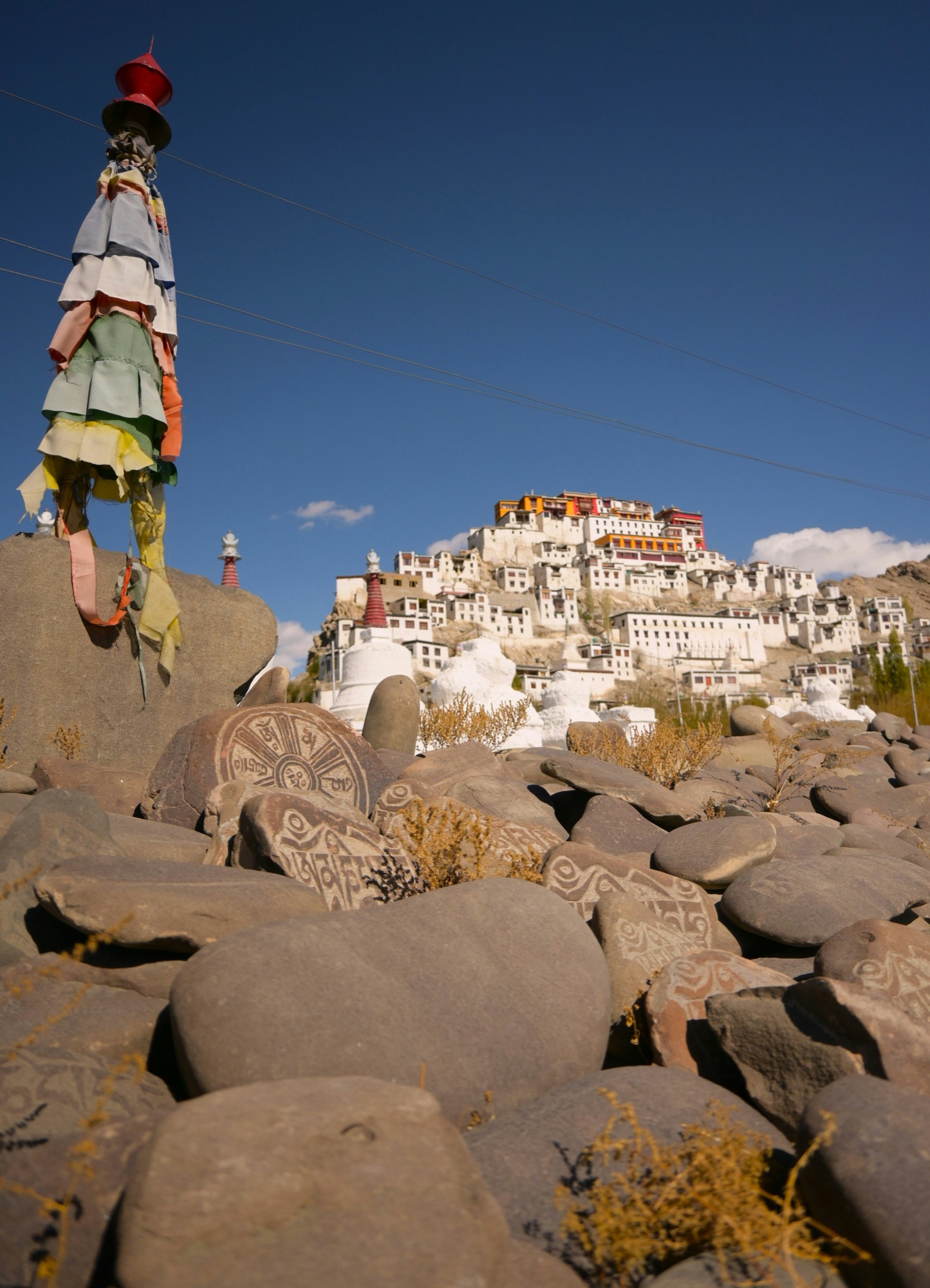Thiksey Monastery and carved mani stones in Ladakh